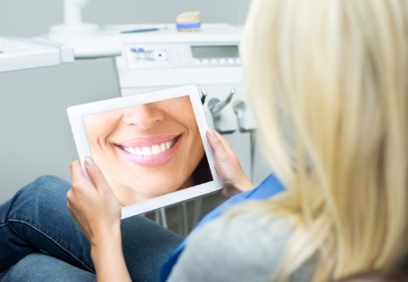 Woman enjoying the benefits of in network dental care