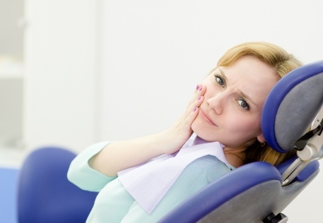 Woman in pain before general tooth extraction