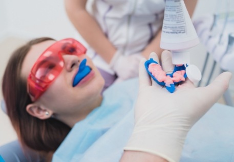 Dental patient receiving fluoride treatment