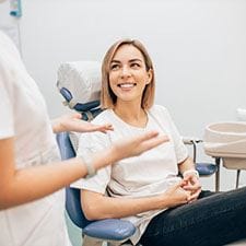 dental patient talking to her dentist 