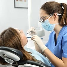woman at a dental cleaning 