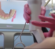Dallas dentist capturing digital bite impressions