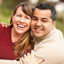 Portrait of a couple embracing outdoors