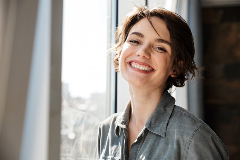 patient smiling with dental implants