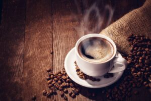 Image of a hot cup of coffee on a table