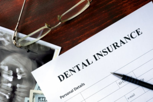 Dental insurance form sitting on a desk