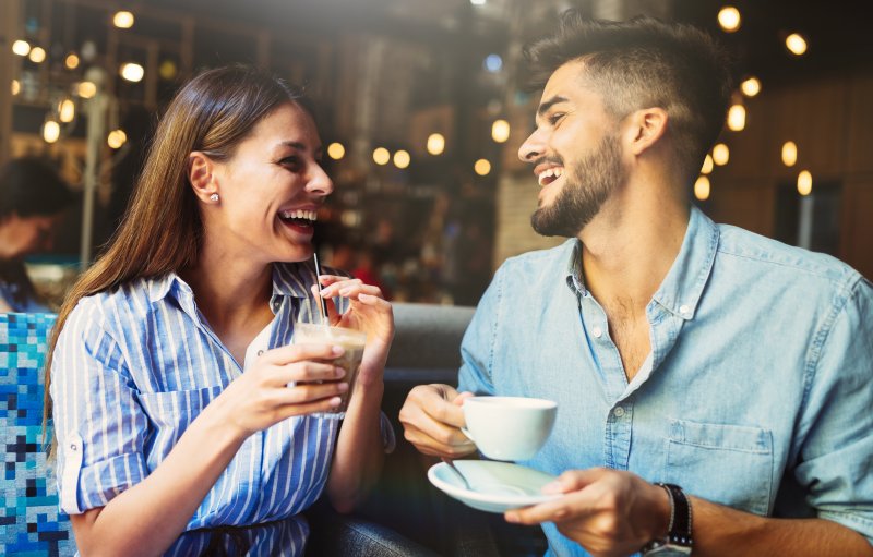 Patient with good oral health smiling on date